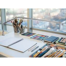 Daylight Slimline 3 LED Table Lamp - Chrome, in use on table