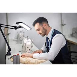 Daylight Lumi Task Lamp - Satin Black (in-use at desk)