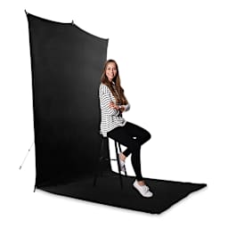 Savage Backdrop Travel Kit - Extended, Black -  with person sitting on stool in front of backdrop
