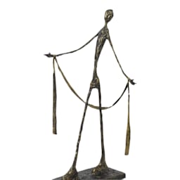 modern figure sculpture in the style of alberto giacometti