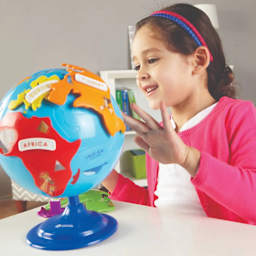 Learning Resources Puzzle Globe child playing with puzzle globe