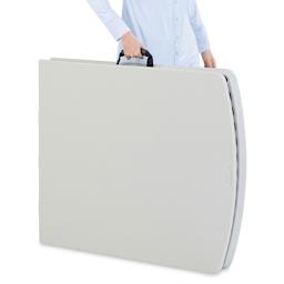 High Durability Folding Table - Person holding folded table for transport
