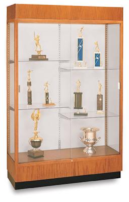 Waddell Carmel Oak Frame Floor Case - left angle view shows 4 half-shelves with trophys and cornice