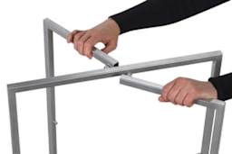 Etagere Displays - Hands rotating legs to set up Etagere
