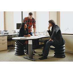 ErgoErgo Stool - Office workers seated on Stools at desk
