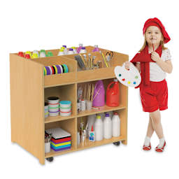 Whitney Brothers Deluxe Mobile Art Supply Cart Child artist standing next to fully loaded cart