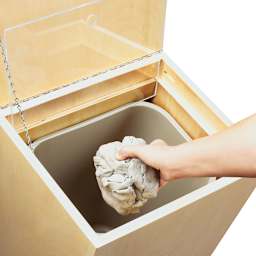 Diversified Spaces Mobile Clay Cart - Top view of hand dropping clay into removable liner of cart