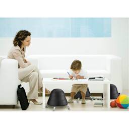 Safco Runtz Ball Chairs - Toddler sitting on Black Chair with adult watching