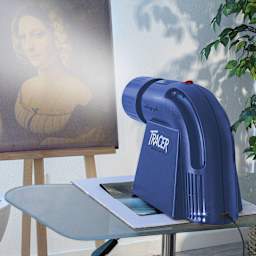 Artograph LED Tracer Projector, on top of the artwork and projecting the image to a canvas