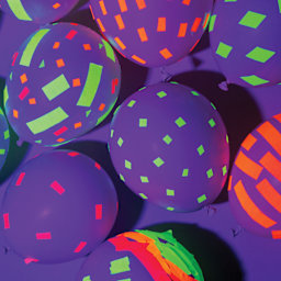 Duck Craft Paper Tapes applied to balloons with blacklight