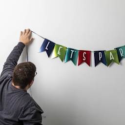 Duck Max Strength Nano-Grab Double Sided Gel Tape - Clear Circles, 1 in - in use to create party banner