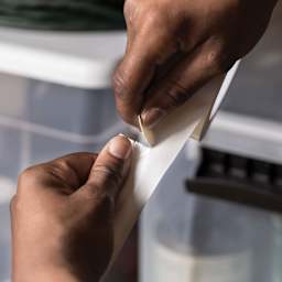 Duck Max Strength Tape - White, 1.88" x 105 ft (Tape being torn)