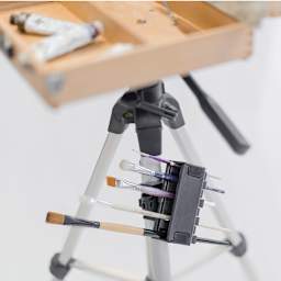 Brush Grip Rotating Brush Holder - mounted at angle on tripod leg