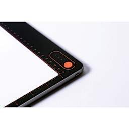 Daylight Tabla Go Rechargeable Light Pad - corner with dimmer button