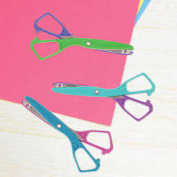 Westcott Kids Safety Scissors varyig colors laying on table