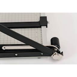Dahle Paper Trimmer - 12" Cutting Length, 19-3/4" x 10-1/4", close-up of the spring action blade