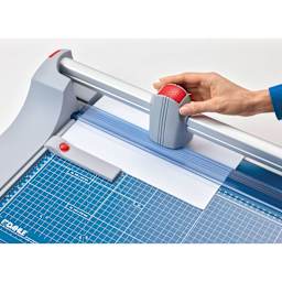 Dahle Premium Rotary Trimmer - 14" Cutting Length, hand pulling blade over paper