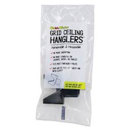 StikkiWorks Grid Ceiling Hanglers Put-er-Up-er Tool, inside of the packaging. 