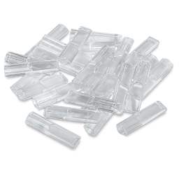 Excel Blades K1 Light Duty Knife - Replacement Safety Caps, Pkg of 25, laid outside of the packaging