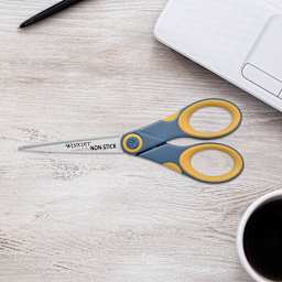 Westcott Straight Titanium Bonded Non-Stick Scissors - 7" sitting closed on table