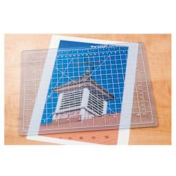 Dahle Self-Healing Cutting Mats - Clear mat placed above photo to show transparency