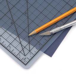 Blick Cutting Board - Transparent, 8.5" x 11" - in use, close-up