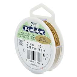 Beadalon 7 Strand Stringing Wire - Angled view of spool of Satin Gold wire
