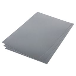 Grafix Metallic Shrink Film - Angled view of Silver sheets