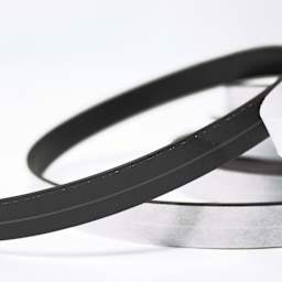 ProMag Adhesive Magnetic Tape Roll - 1/2" x 25 ft close up to show magnetic side