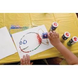 Spectra Sparkling Crystals Glitter (child adding glitter to fish drawing)