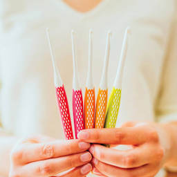 Prym Ergonomics Crochet Hook Sets - Small, Set of 5, being held.