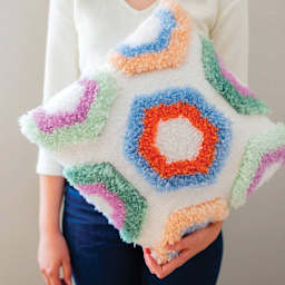 Loran Latch-Stitch Pillow Kits - Hexi, 16" x 16" (Finished pillow being held)