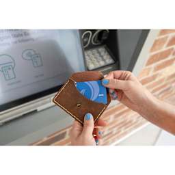 Realeather Envelope Card Case, holding a debit card