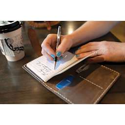 Realeather Leather Field Notes and Passport Cover - Kit of 8, leather portfolio holding a notebook being written in