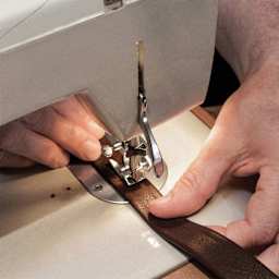 Realeather Premium Trim Leather - Chocolate, leather piece in sewing machine
