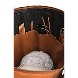 Muud Saturn XL Leather Needlework Project Bag - Brown - close-up, holding 