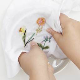 Rico Design Stick and Stitch Embroidery Kit - Pkg of 15, Spring Flowers rinsing graphics in bowl of water