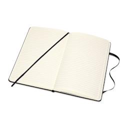 Moleskine Classic Leather Notebook - Black, Large, Ruled, 5" x 8-1/4" (open to show paper)