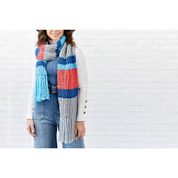 Red Heart Heat Wave Yarn - Model wearing Multi-color Scarf 