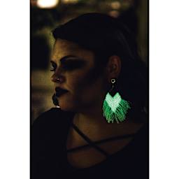 Lion Brand DIY Glow Yarn - person wearing glow in the dark earings