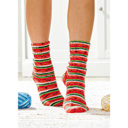 Premier Yarn Fruits Yarn - Watermelon (person wearing socks made with Watermelon yarn)