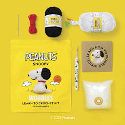 The Woobles Beginner Crochet Amigurumi Kit - Snoopy - packaging and contents