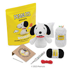 The Woobles Beginner Crochet Amigurumi Kit - Snoopy - contents and finished amigurumi