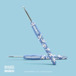 The Woobles Beginner Crochet Amigurumi Kit - Cinnamoroll from Hello Kitty - front and back of crochet needle