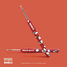 The Woobles Beginner Crochet Amigurumi Kit - Hello Kitty from Hello Kitty - front and back of crochet needle