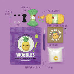 The Woobles Beginner Crochet Amigurumi Kit - Pinya the Pineapple - packaging and contents
