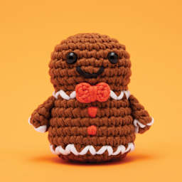 The Woobles Beginner Crochet Amigurumi Kit - Ted the Gingerbread Man, finished example