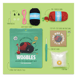 The Woobles Beginner Crochet Amigurumi Kit - Iris the Ladybug, packaging and contents