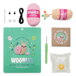 The Woobles Beginner Crochet Amigurumi Kit - Mimi the Snail, packaging and contents