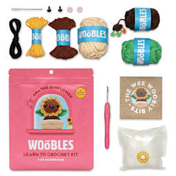 The Woobles Beginner Crochet Amigurumi Kit - Ana the Sunflower contents with packaging